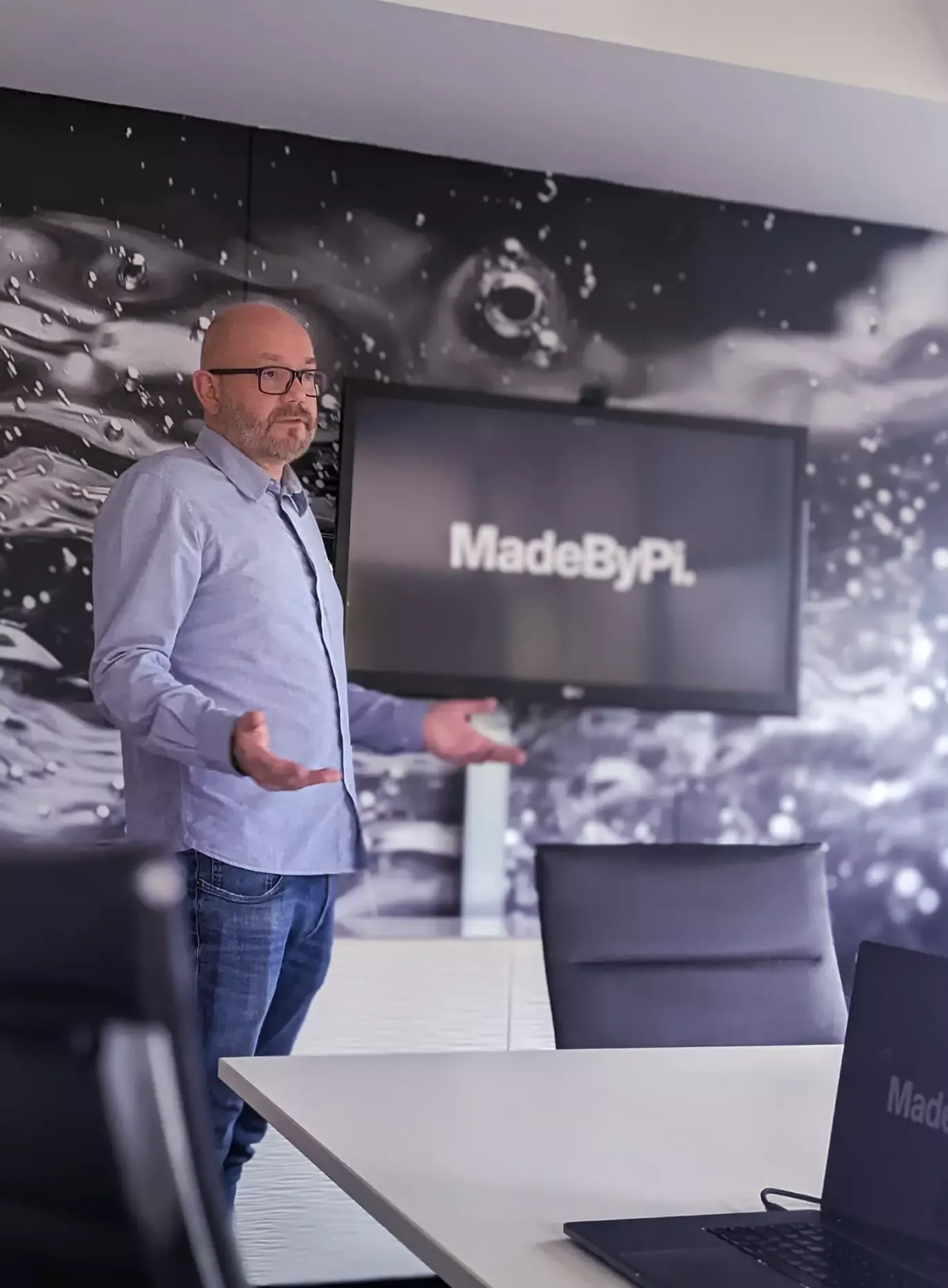 member of the team leading a meeting